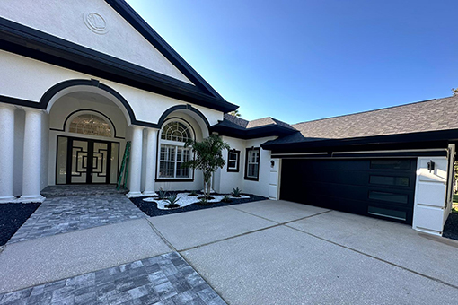 Exterior of Tampa House After Upgrading to Impact Doors and Windows