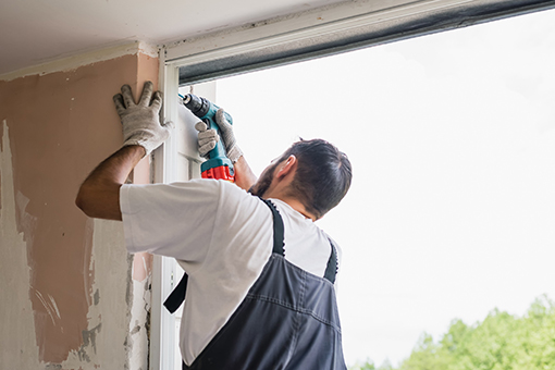 Tampa FL Carpenter Installing Commercial Impact Door